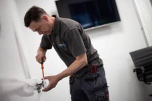 Electrician working in commercial office building